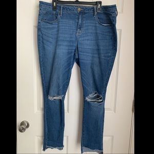 Distressed mid-rise skinny jeans
